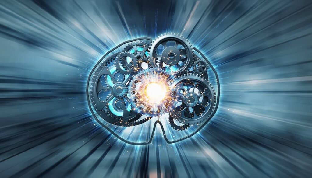 脳科学に基づいたモチベーションの着火と行動開始のエネルギーを象徴するギアとスパークのイメージ画像